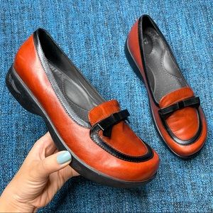 Dansko Red and Black Leather Bow Tie Clogs